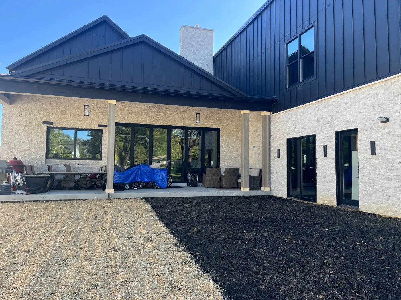 Tarping and dry-in on a Springmill Villages commercial roof